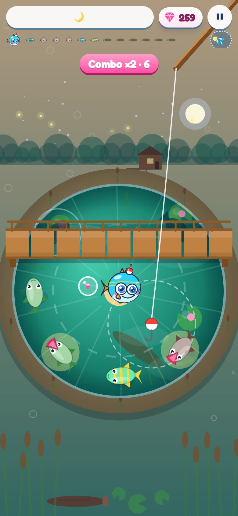Gameplay: the sun sets, the moon rises, the fish gather around Boop and the last catches pay their gems