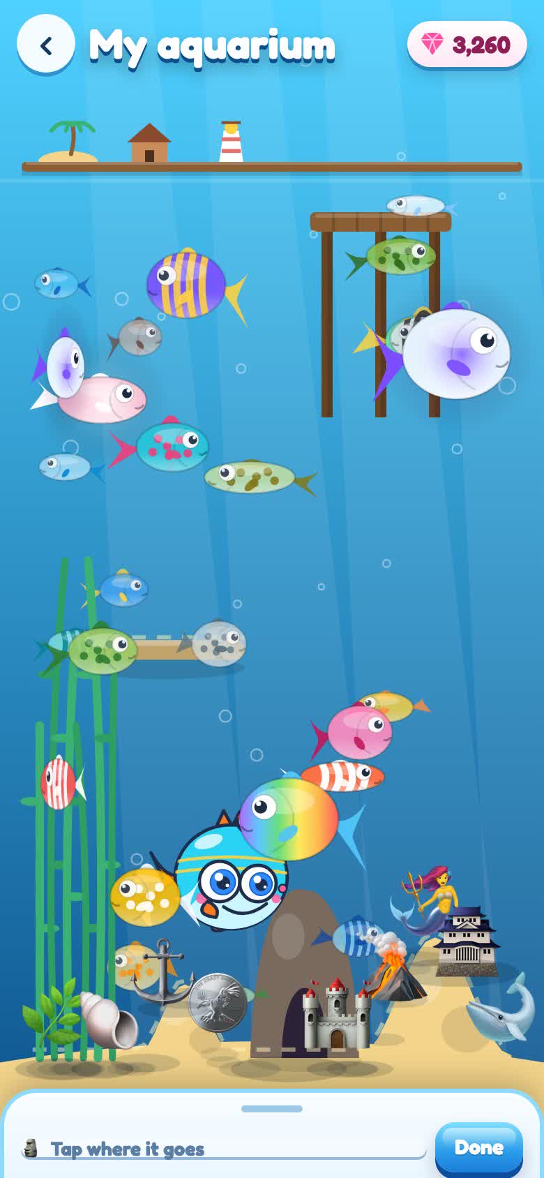 Gameplay: free placement — the Decorate card, “Tap where it goes”, a piece dropped on a sand hill, arrange mode with a drag and a flip, Tidy